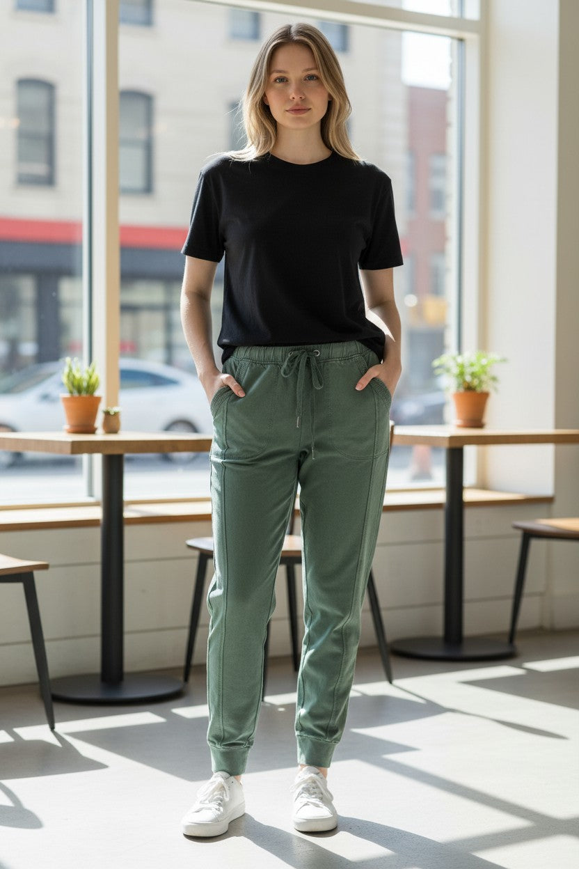 Lady Bear Resale green cotton blend joggers with drawstring waist and pockets, size XS.