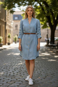 Lady Bear Resale size 4 petite light blue denim dress with pockets and ruched three-quarter sleeves.