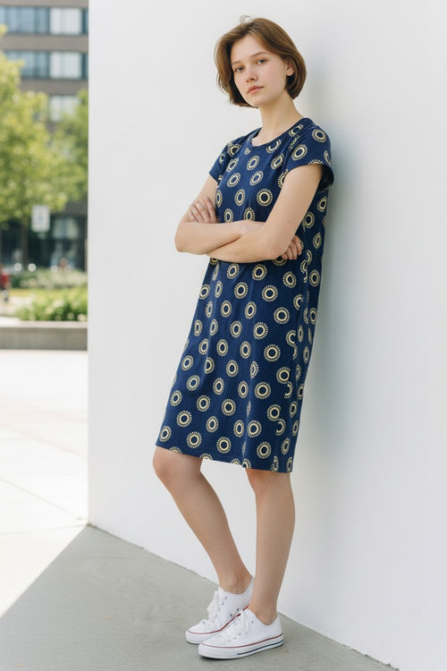 Lady Bear Resale navy blue jersey knit sun dress with a white sun print, size 4R. Short sleeves and round neckline.