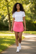 Lady Bear Resale Lululemon pink athletic skort with built-in shorts and zip pocket, size small.
