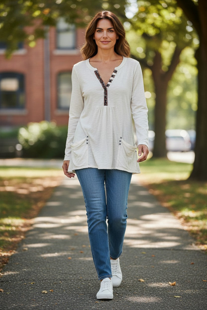 Lady Bear Resale white long sleeve cotton blend tunic shirt with decorative stitching and front pockets, size Medium.